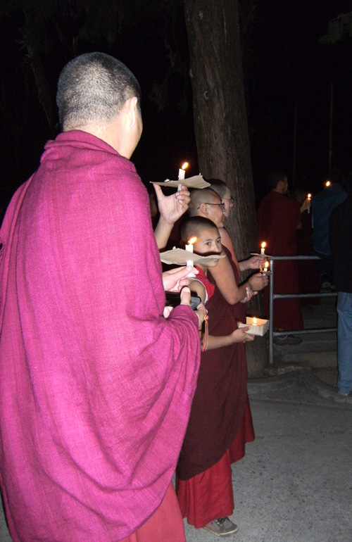 Some of the thousands of monks and nuns at Dharamsala’s now nightly candlelight vigils
