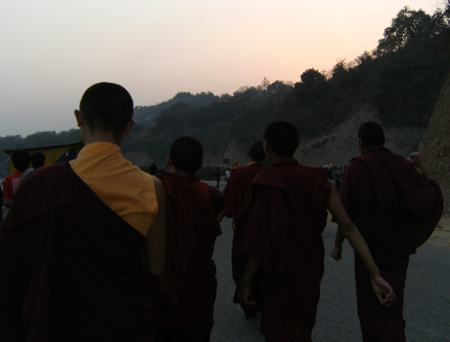 Some of the monks on our 30km march as dusk drew in